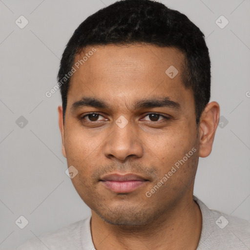Neutral latino young-adult male with short  black hair and brown eyes