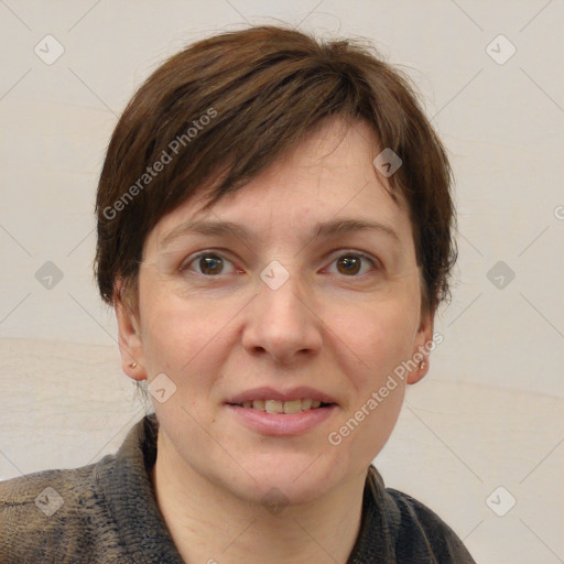 Joyful white adult female with short  brown hair and grey eyes