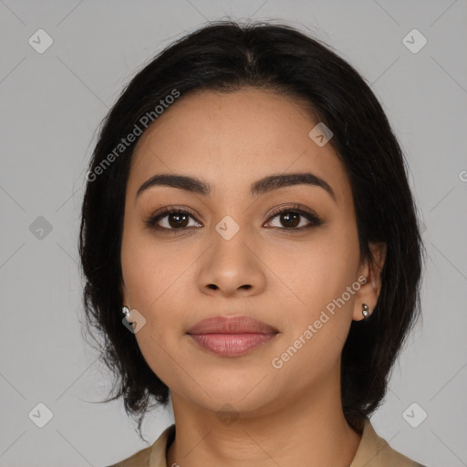 Joyful latino young-adult female with medium  black hair and brown eyes