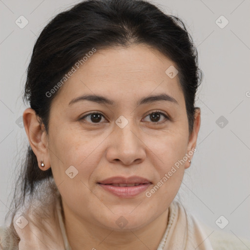 Joyful white adult female with medium  brown hair and brown eyes