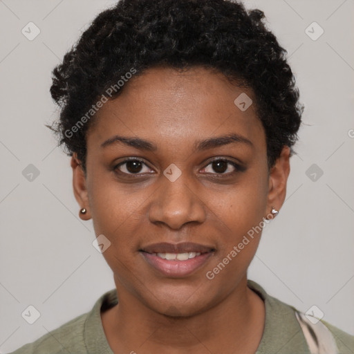 Joyful black young-adult female with short  black hair and brown eyes