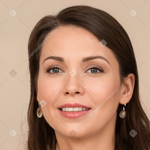 Joyful white young-adult female with long  brown hair and grey eyes