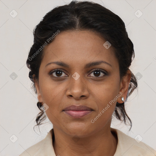 Joyful black young-adult female with medium  brown hair and brown eyes