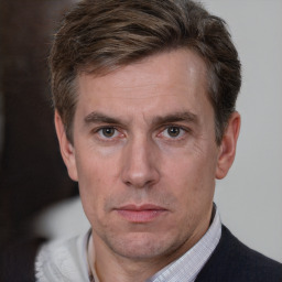 Neutral white adult male with short  brown hair and brown eyes