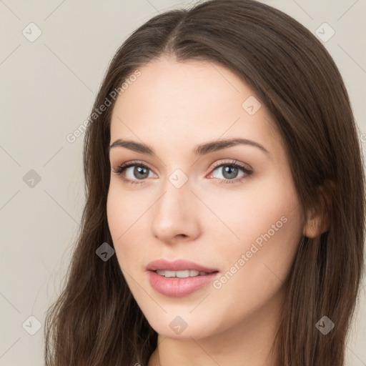 Neutral white young-adult female with long  brown hair and brown eyes