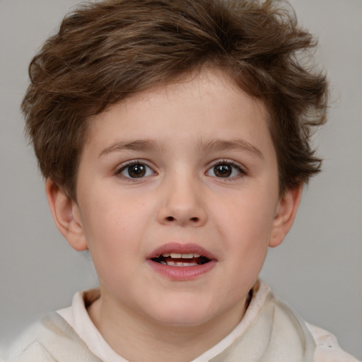 Joyful white child female with short  brown hair and brown eyes