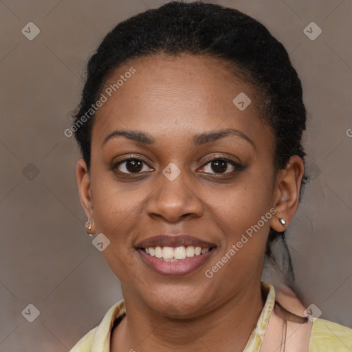 Joyful black young-adult female with short  brown hair and brown eyes