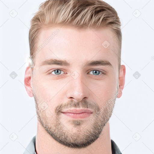 Joyful white young-adult male with short  brown hair and blue eyes