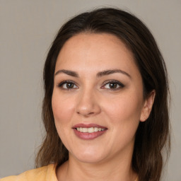 Joyful white young-adult female with medium  brown hair and brown eyes