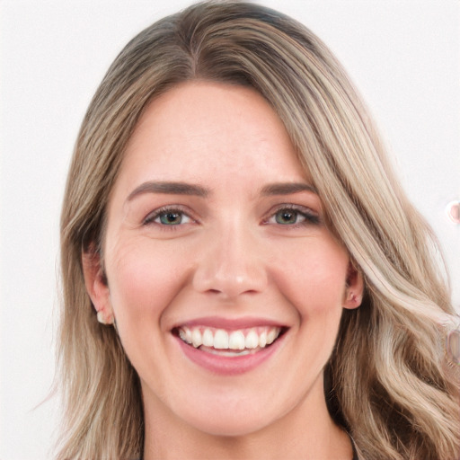 Joyful white young-adult female with long  brown hair and blue eyes