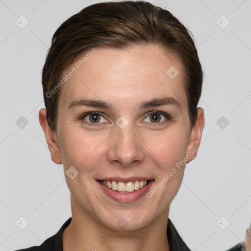 Joyful white young-adult female with short  brown hair and grey eyes