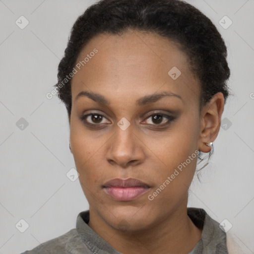 Neutral black young-adult female with short  brown hair and brown eyes