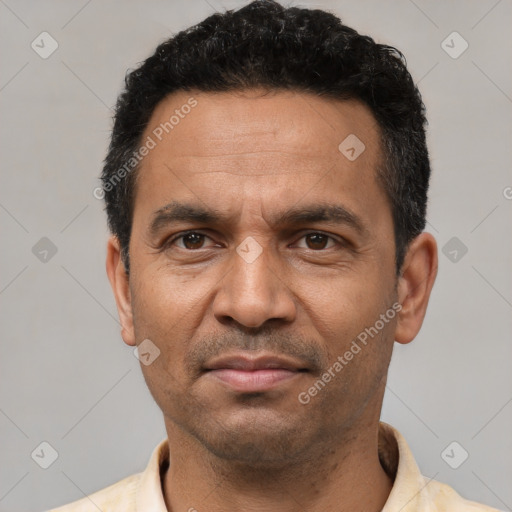 Neutral latino adult male with short  black hair and brown eyes