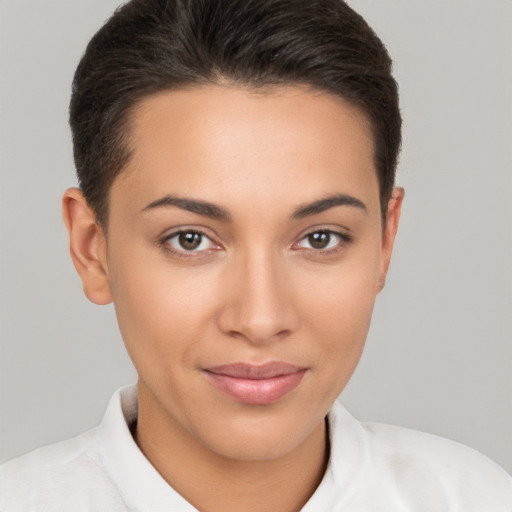 Joyful white young-adult female with short  brown hair and brown eyes