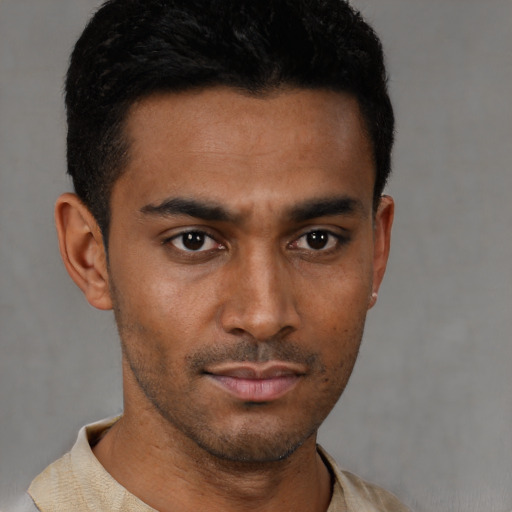 Neutral latino young-adult male with short  black hair and brown eyes