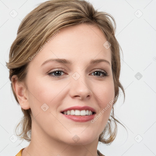 Joyful white young-adult female with medium  brown hair and blue eyes