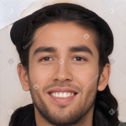 Joyful white young-adult male with short  black hair and brown eyes