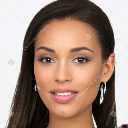 Joyful latino young-adult female with long  brown hair and brown eyes