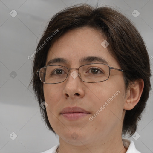 Joyful white adult female with medium  brown hair and brown eyes