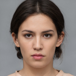 Neutral white young-adult female with medium  brown hair and brown eyes