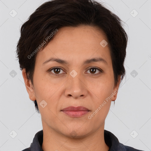 Joyful white adult female with short  brown hair and brown eyes