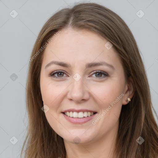 Joyful white young-adult female with long  brown hair and grey eyes