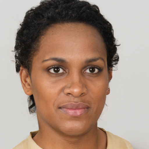 Neutral black young-adult female with short  brown hair and brown eyes