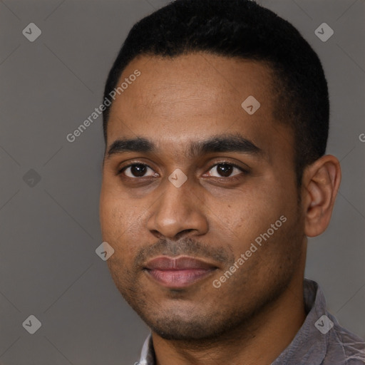 Joyful black young-adult male with short  black hair and brown eyes