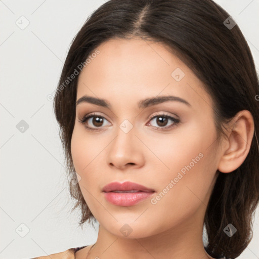 Neutral white young-adult female with long  brown hair and brown eyes