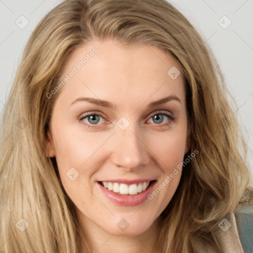 Joyful white young-adult female with long  brown hair and green eyes