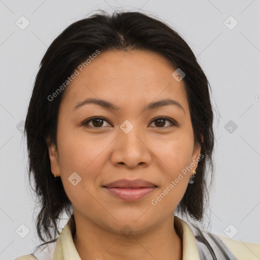 Joyful latino young-adult female with medium  brown hair and brown eyes