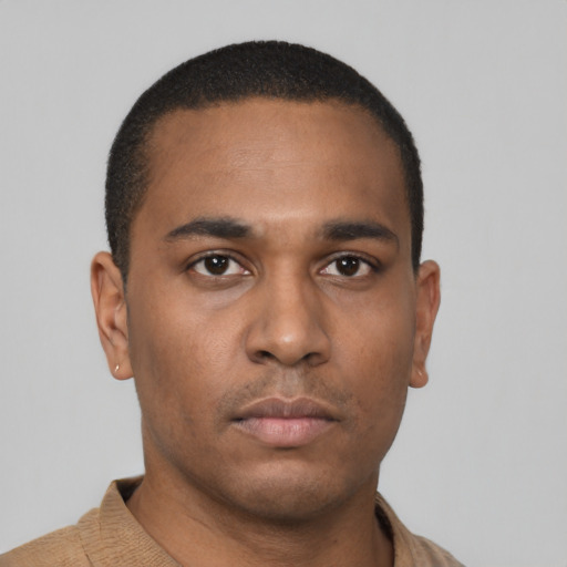 Neutral latino young-adult male with short  brown hair and brown eyes