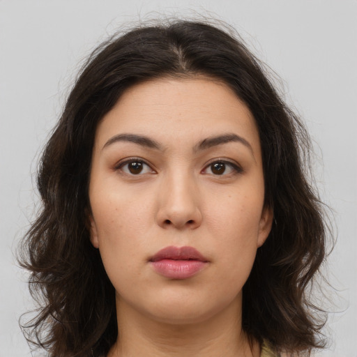Neutral white young-adult female with medium  brown hair and brown eyes