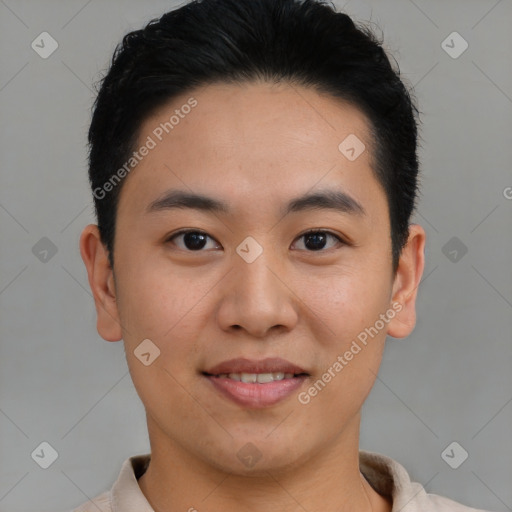 Joyful asian young-adult male with short  brown hair and brown eyes