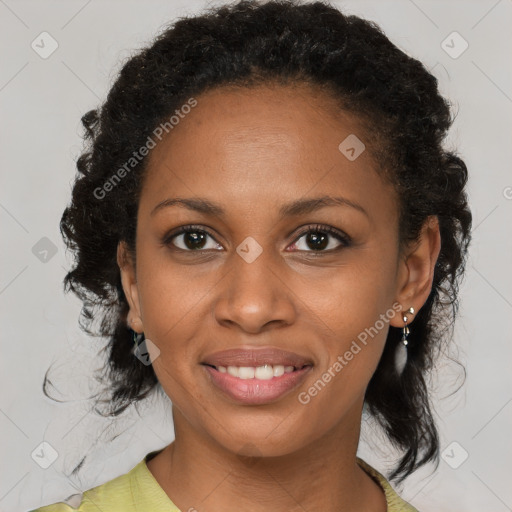 Joyful black young-adult female with medium  brown hair and brown eyes