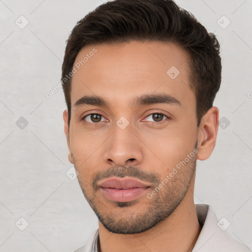 Neutral white young-adult male with short  brown hair and brown eyes