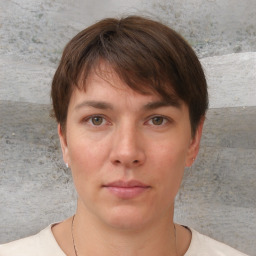 Neutral white young-adult female with short  brown hair and brown eyes