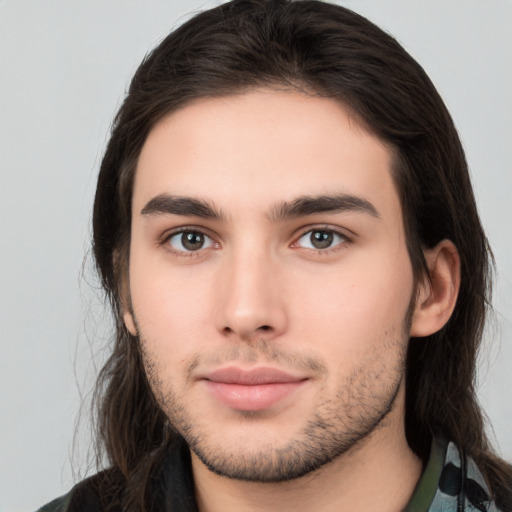 Neutral white young-adult male with medium  brown hair and brown eyes