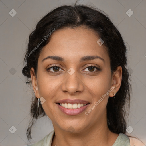 Joyful latino young-adult female with medium  brown hair and brown eyes