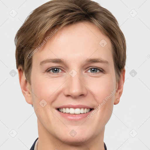 Joyful white young-adult female with short  brown hair and grey eyes