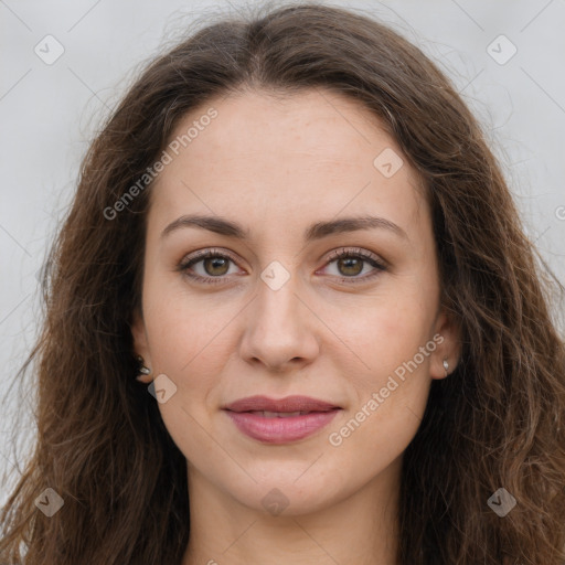 Joyful white young-adult female with long  brown hair and green eyes