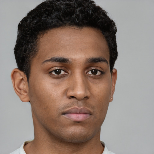 Neutral black young-adult male with short  brown hair and brown eyes