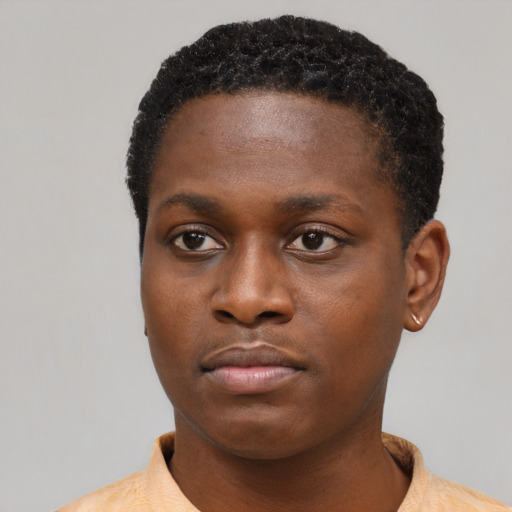 Neutral black young-adult female with short  black hair and brown eyes