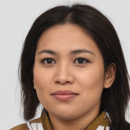 Joyful asian young-adult female with medium  brown hair and brown eyes