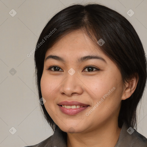 Joyful asian young-adult female with medium  brown hair and brown eyes