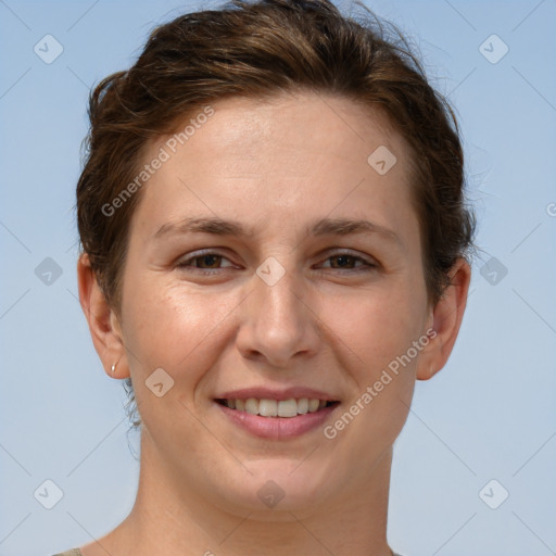 Joyful white adult female with short  brown hair and brown eyes