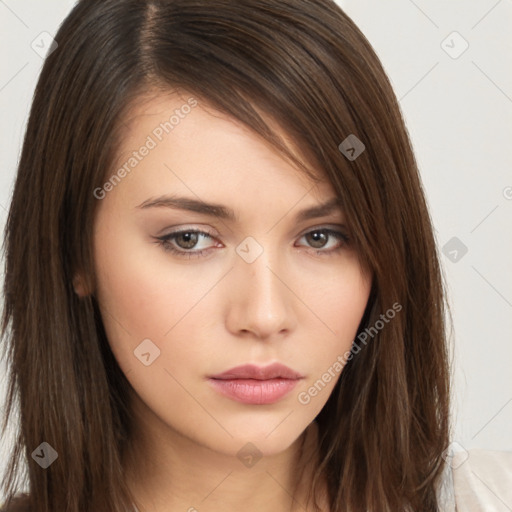 Neutral white young-adult female with long  brown hair and brown eyes