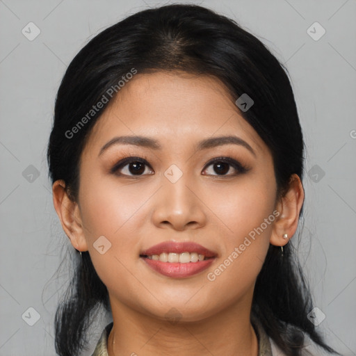 Joyful asian young-adult female with medium  black hair and brown eyes