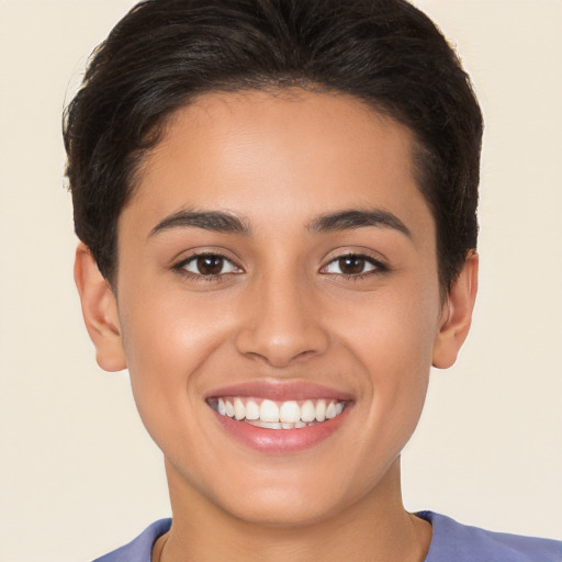 Joyful white young-adult female with short  brown hair and brown eyes