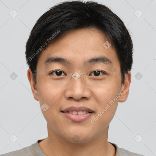 Joyful asian young-adult male with short  brown hair and brown eyes